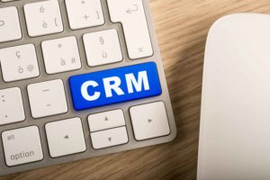 Tecla con texto "CRM"