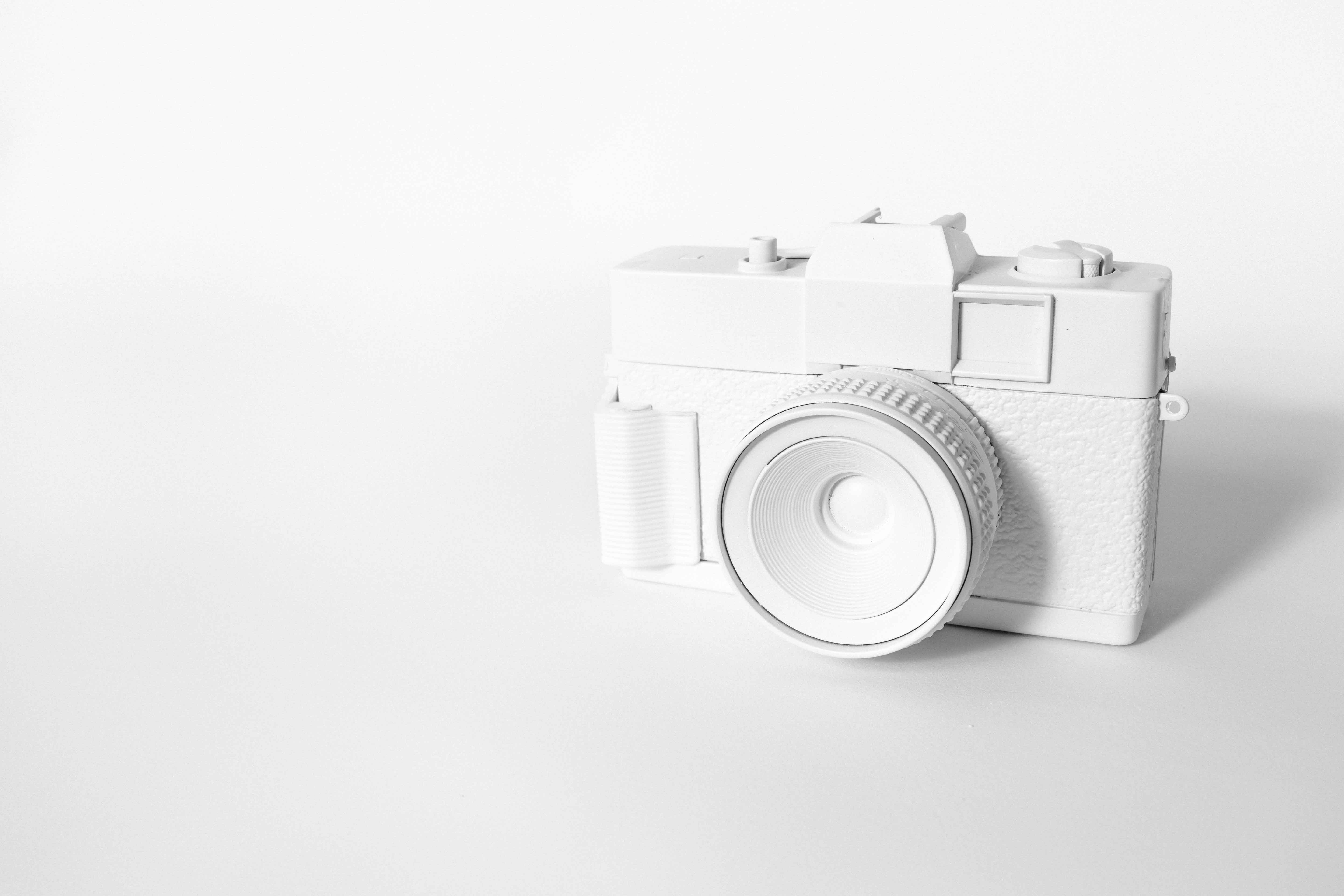 Ilustración de cámara de fotos en blanco