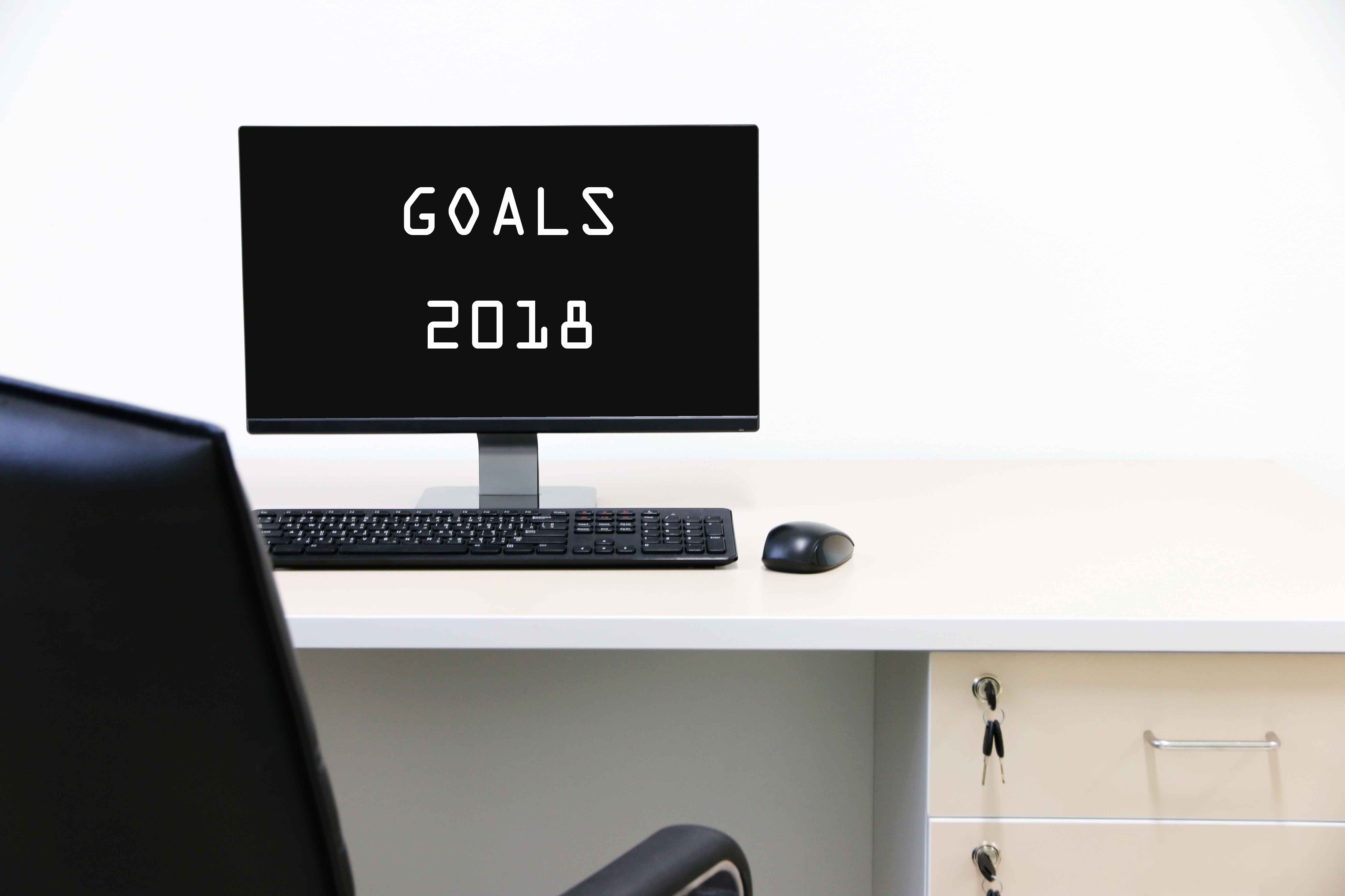 Pantalla de ordenador con el mensaje "Objetivos 2018"